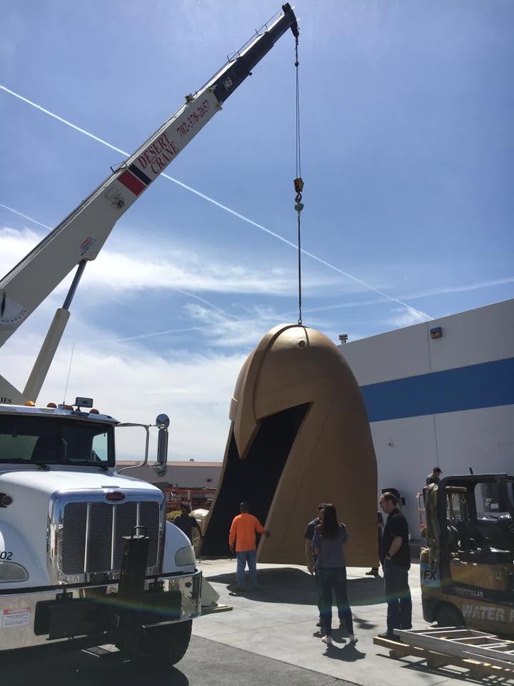 Giant gladiator helmet sculpture lift